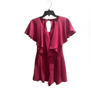 DEJA VU Fuschia Romper W/Flutter Top with a low back‎ open